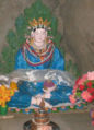 Image of Mandarava in her retreat cave next to Guru Rinpoche's cave above Tso Pema