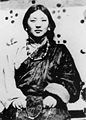 Often mistaken for a portrait of Khandro Tsering Chödrön, this has actually been identified as Mayum Tsering Wangmo (by the one portrayed herself)